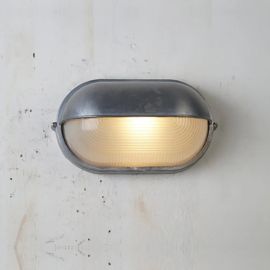 Strata Industrial Ribbed Glass Outdoor Bulkhead Wall Light