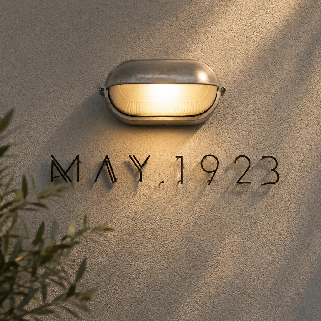 Strata Industrial Ribbed Glass Outdoor Bulkhead Wall Light
