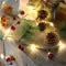 Battery Operated Christmas Garland Lights with Warm White LED and Pine Cones - Image 1
