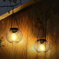 Halloween Solar Powered Outdoor Light Hanging Lantern with Black Wire Mesh Globe and Edison LED - Image 1