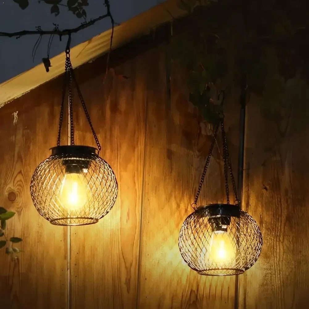 Halloween Solar Powered Outdoor Light Hanging Lantern with Black Wire Mesh Globe and Edison LED - Image 1