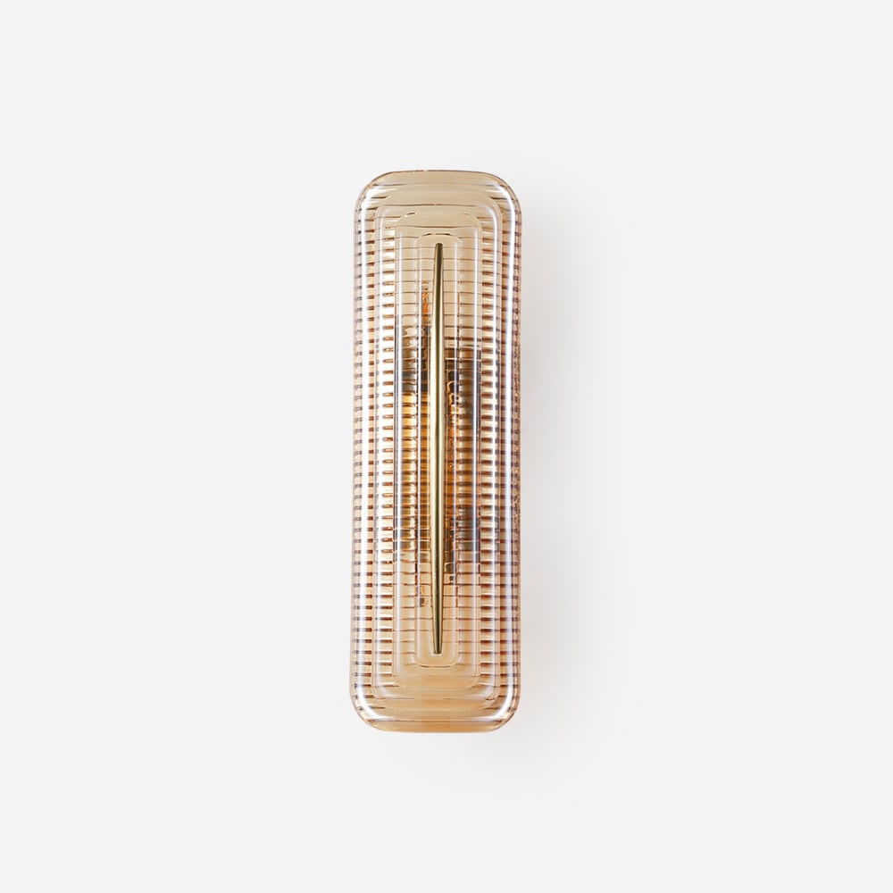 Wall Sconce Lighting with Brass Mount and Ribbed Glass Shade - Image 1
