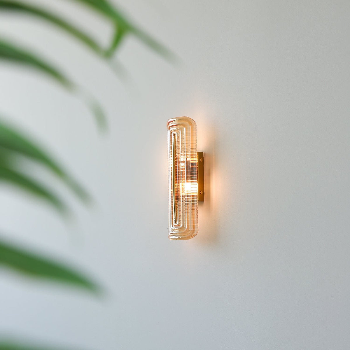 Wall Sconce Lighting with Brass Mount and Ribbed Glass Shade - Image 4