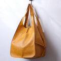Women's Leather Tote Bag with Large Capacity Slouchy Silhouette and Magnetic Snap - Image 1
